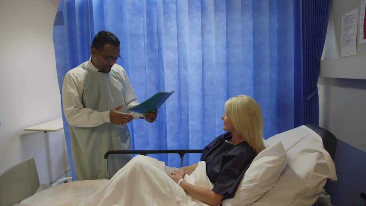 Kerryn is briefed before the treatment by her doctor