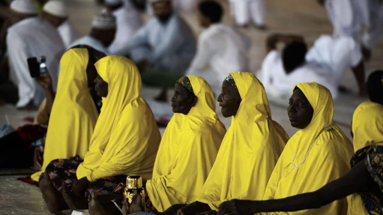 muslim20pilgrims20arrive20for20a20prayer20at20mecca27s20grand20mosque20-20getty-001.jpg