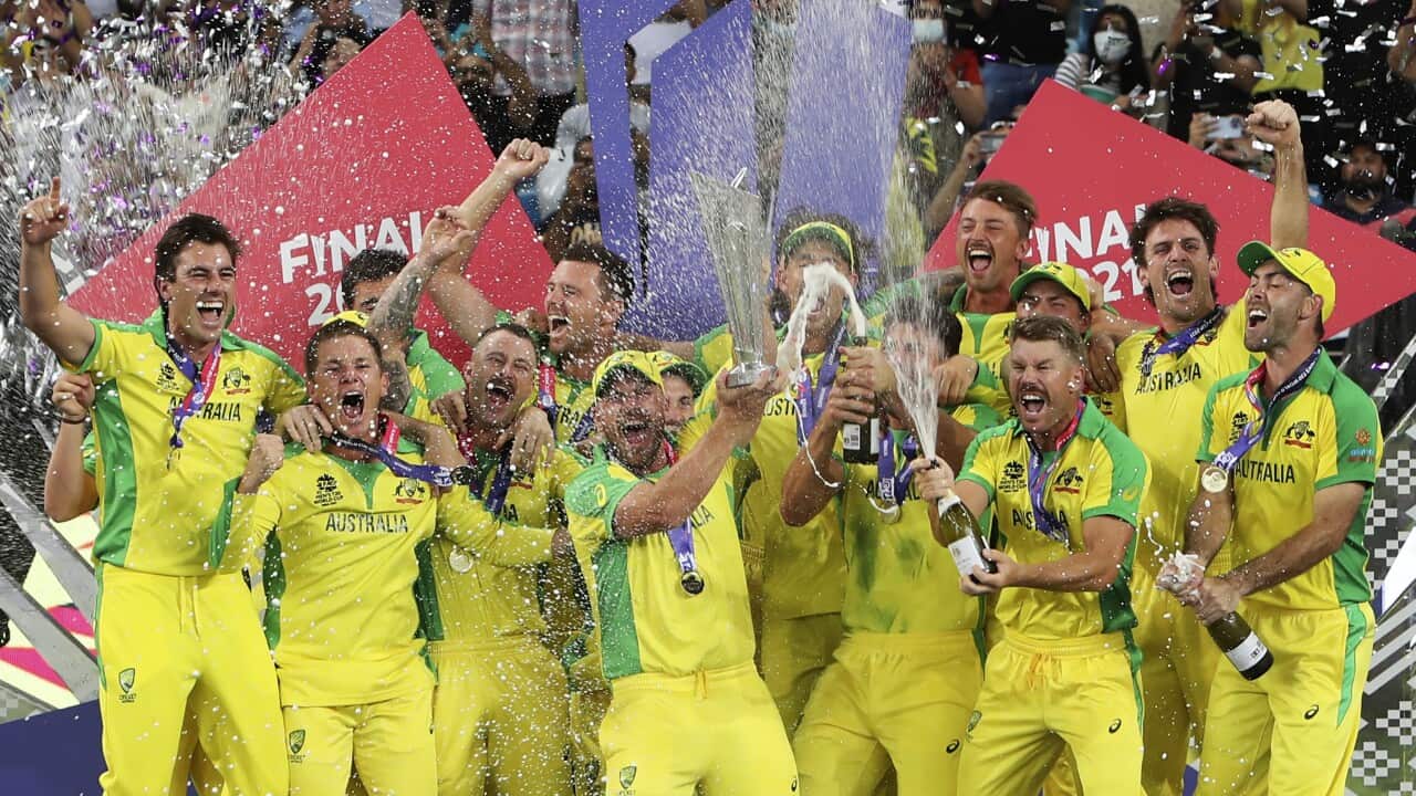 Australian cricketers celebrate after winning the Cricket Twenty20 World Cup final match in Dubai, UAE, Sunday, Nov. 14, 2021. (AP Photo/Aijaz Rahi)