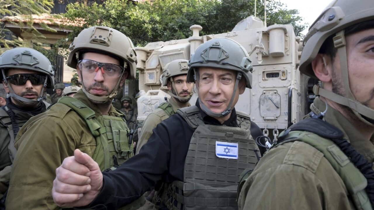 Israeli pm Benjamin Netanyahu receives a security briefing in the northern Gaza Strip (AAP)