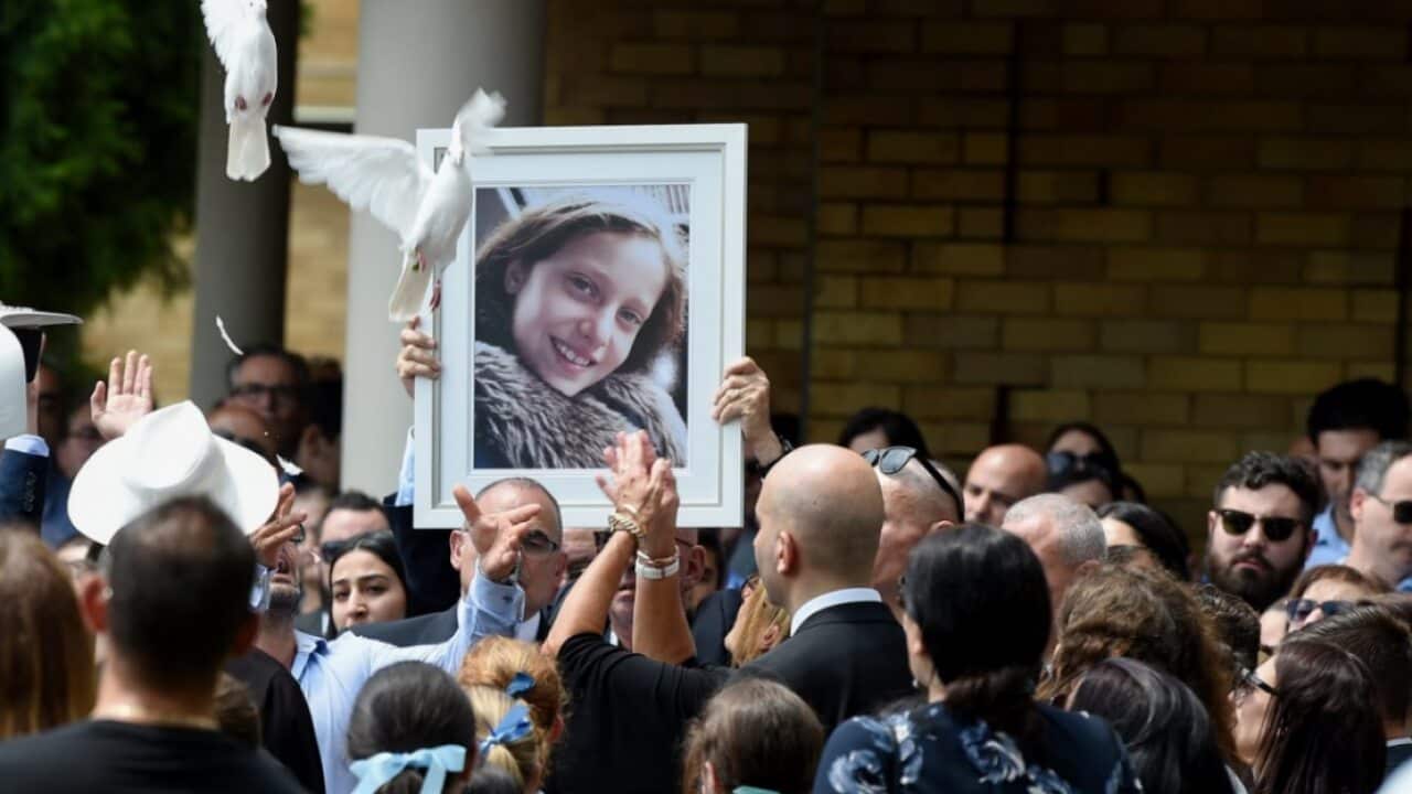 Doves are released after the funeral for Veronique Sakr, 11, at the Santa Sabina College Chapel in Sydney, Tuesday, February 11, 2020.
