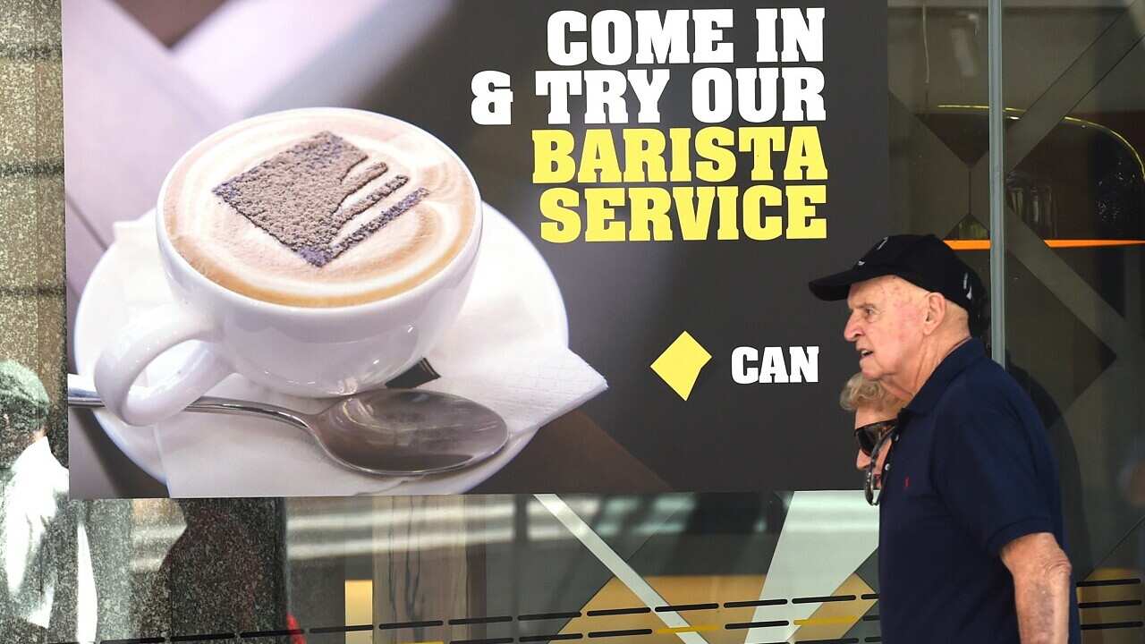Commonwealth Bank advertising is seen outside its main branch in Brisbane