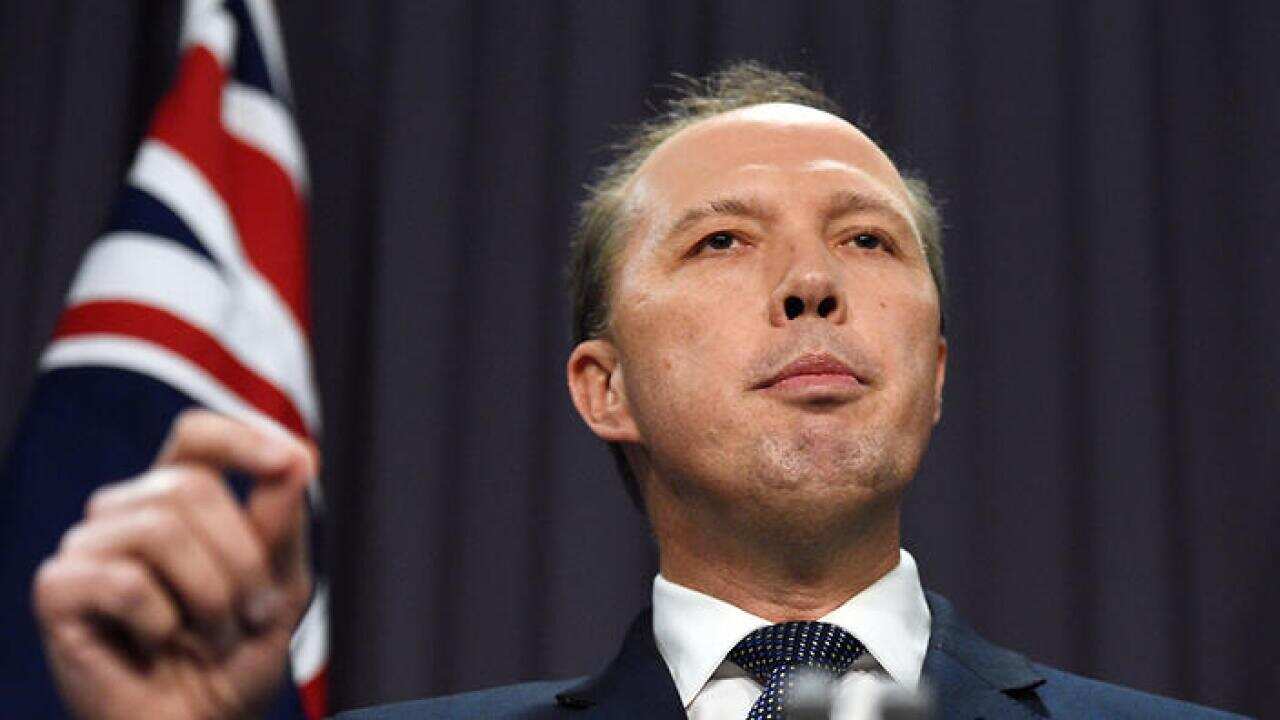 Minister for Immigration and Border Protection Peter Dutton at a press conference at Parliament House in Canberra, Wednesday, Nov. 2, 2016. (AAP Image/Mick Tsikas) NO ARCHIVING