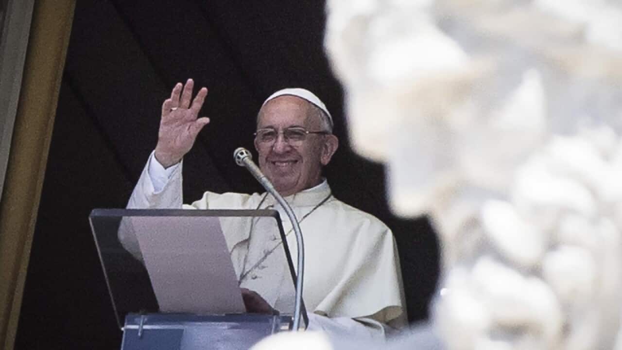 Pope Francis waves in Saint Peter's square, Vatican City