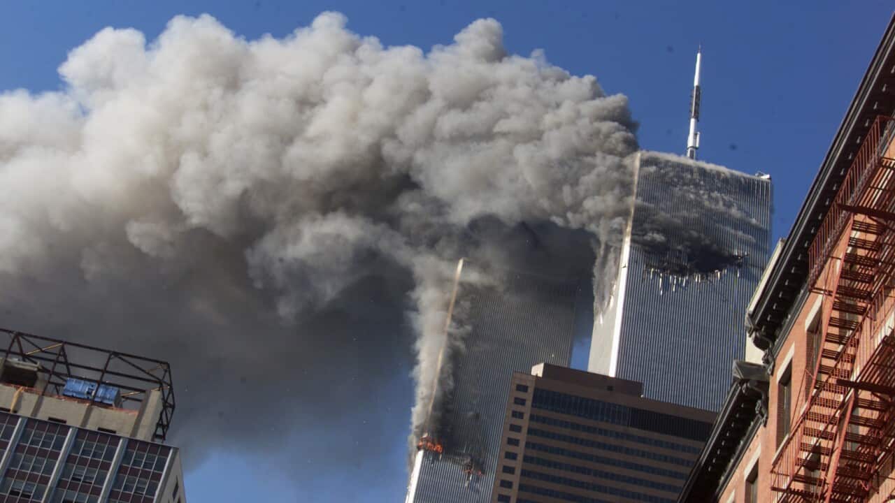 Smoke rising from the twin towers of the World Trade Center.