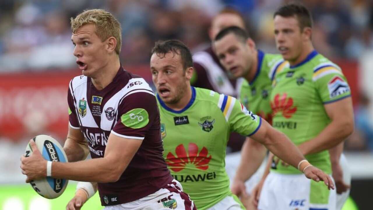 Manly's Tom Trbojevic runs with the ball as the Sea Eagles play the Canberra Raiders in round five of the NRL in Albury, Saturday, April 4, 2015. (AAP Image/Julian Smith) NO ARCHIVING, EDITORIAL USE ONLY