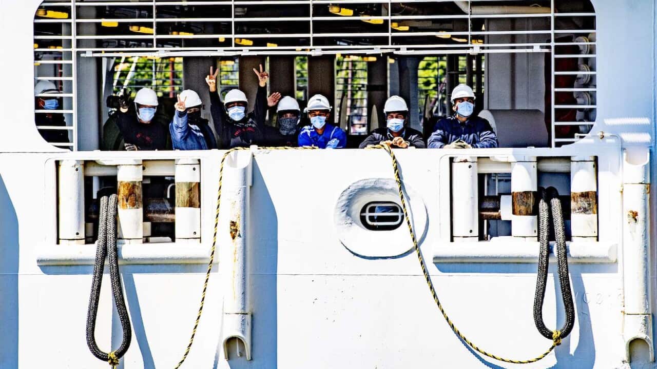 Seafarers in Rotterdam - Crew members wearing face masks.