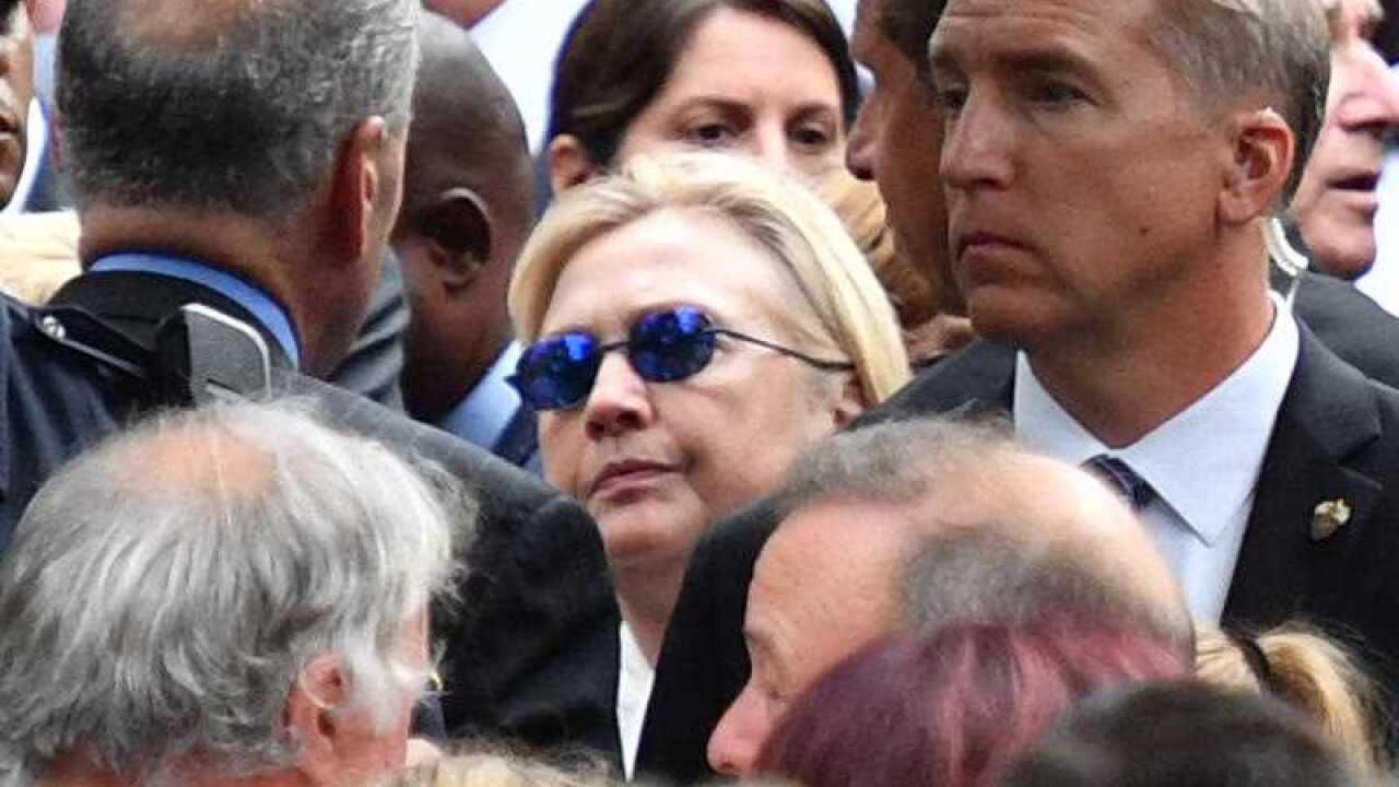 Hillary Clinton, Democratic presidential candidate, attends a memorial ceremony to mark the 15th anniversary of the Sept. 11 attacks in New York on Sept. 11