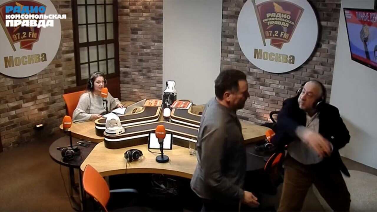 Maxim Shevchenko (L) had been debating Nikolay Svanidze on a Russian radio program.