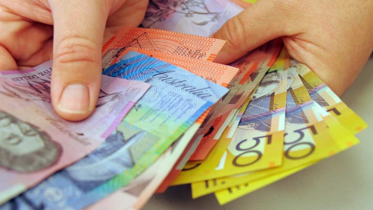 Banknotes being counted in Canberra