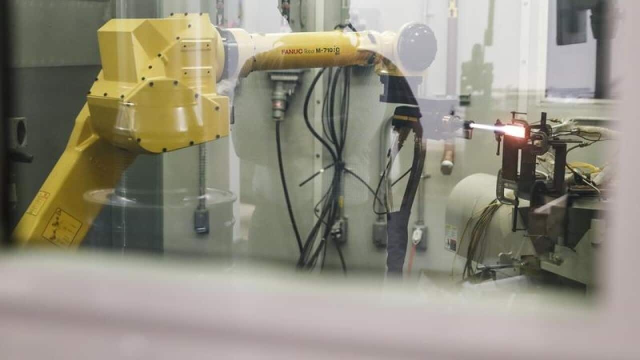 A robotic arm is remotely operated.