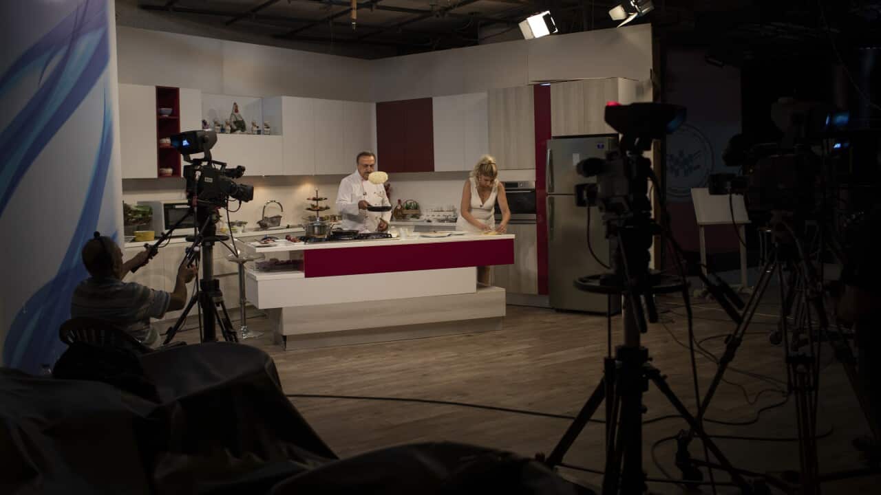 Chef Antoine El Hajj demonstrates recipes with affordable ingredients on a TV show in Beirut, July 7, 2020.