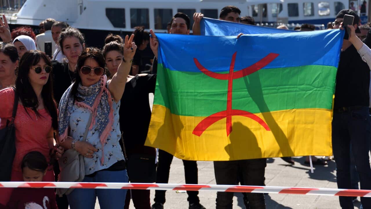 Algerians hold a protest