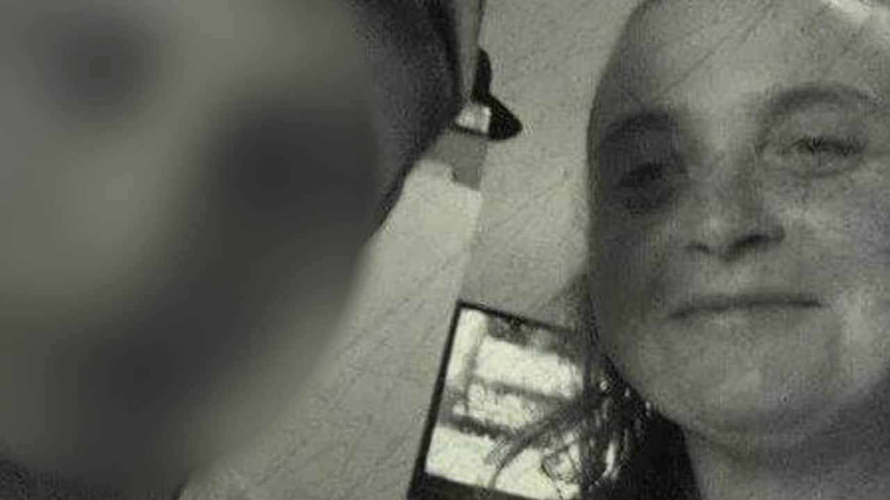 A picture of Kylie with her 24-year-old son who's in Metropolitan Remand and Reception Centre at Silverwater in Sydney, begging to get vaccinated.