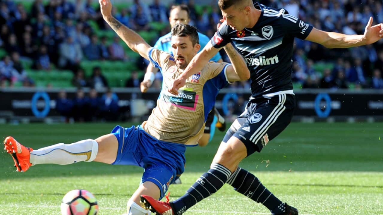 Melbourne Victory winger Mitch Austin (R)