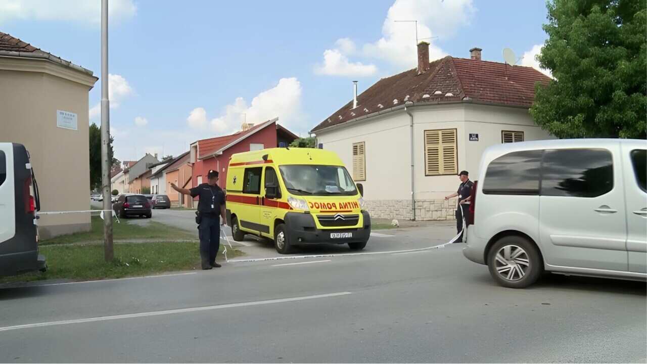 Police set up a cordon at the shooting scene (AP).jpg