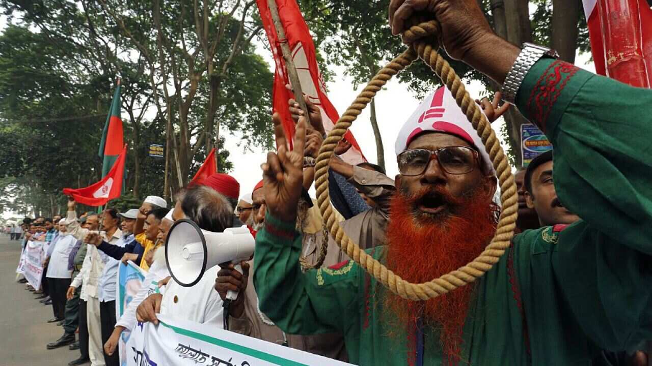 Bangladeshi secular activists and former fighters who fought in the 1971 war of independence against Pakistan protest as they call for the death penalty to be upheld for opposition leaders for Salauddin Quader Chowdhury and Ali Ahsan Mohammad Mujahid, ove