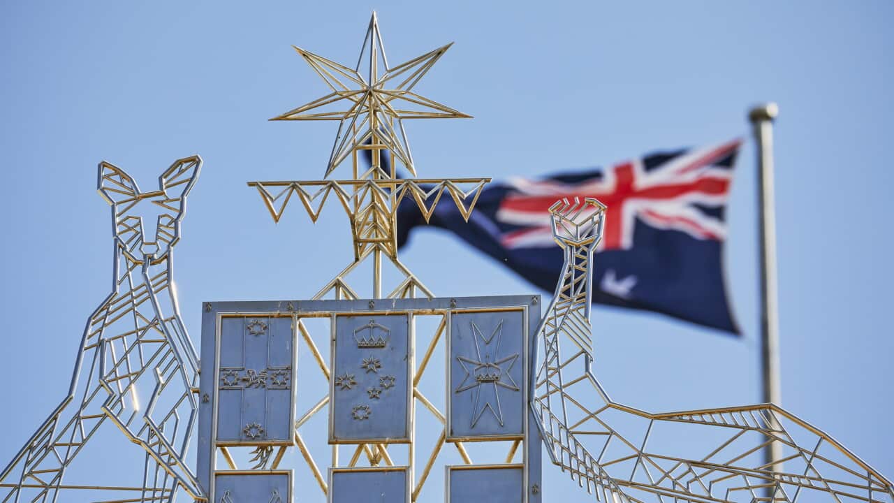 Australian Coat of Arms with Kangaroo and Emu symbol at entrance to Parliament House Canberra, Australia