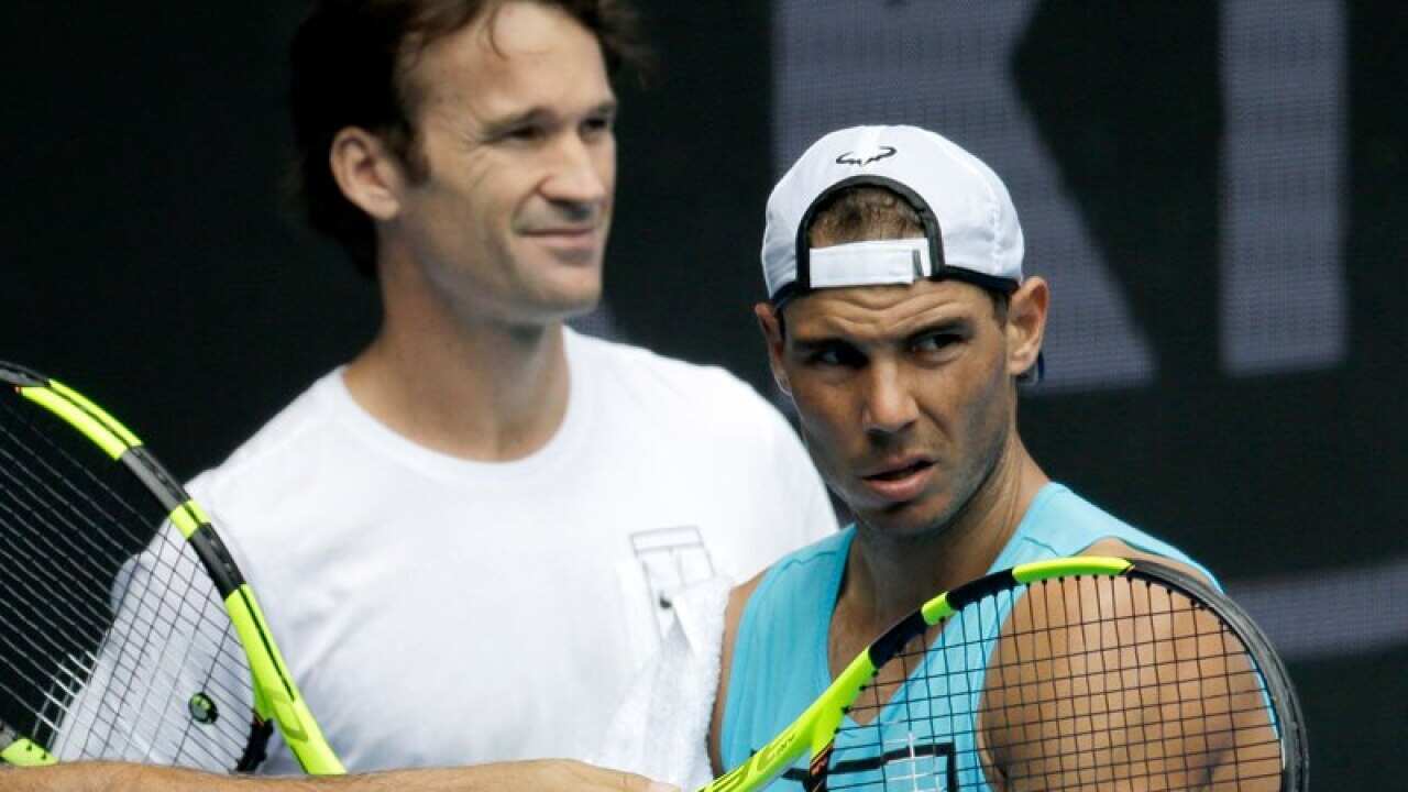 Spain's Rafael Nadal and coach Carlos Moya