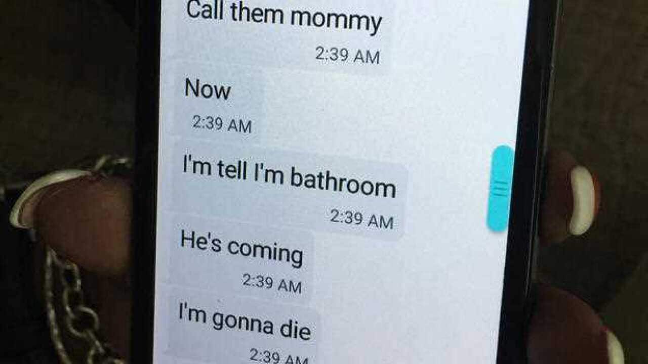 Mina Justice shows a text she received from her son Eddie Justice at Pulse nightclub during a fatal shooting in Orlando, Florida.