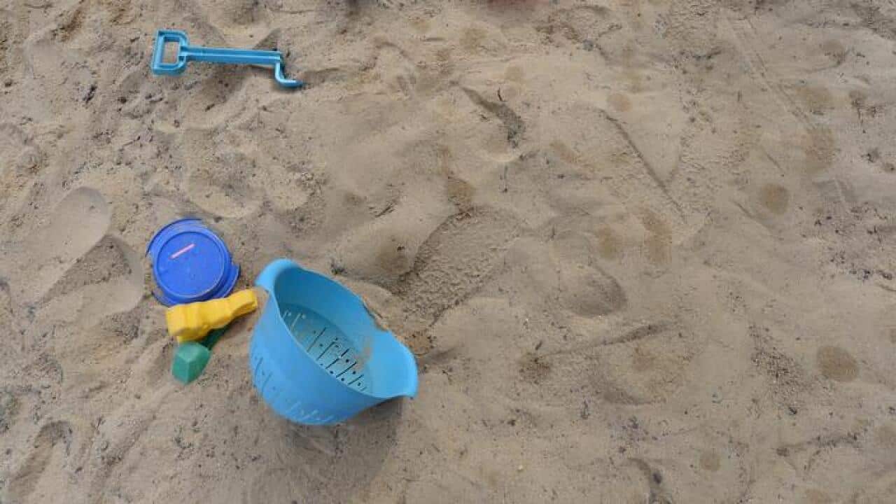 The boys had used spades from a sandpit to dig under a property fence.