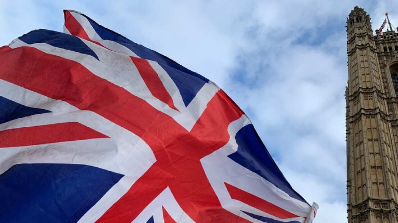 Pro and anti Brexit protesters demonstrate outside the Houses of Parliament.