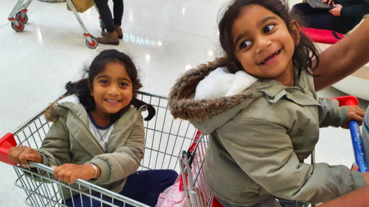 Kopika (L) and Tharnicaa Murugappan out and about in Perth, 21 June 2021.