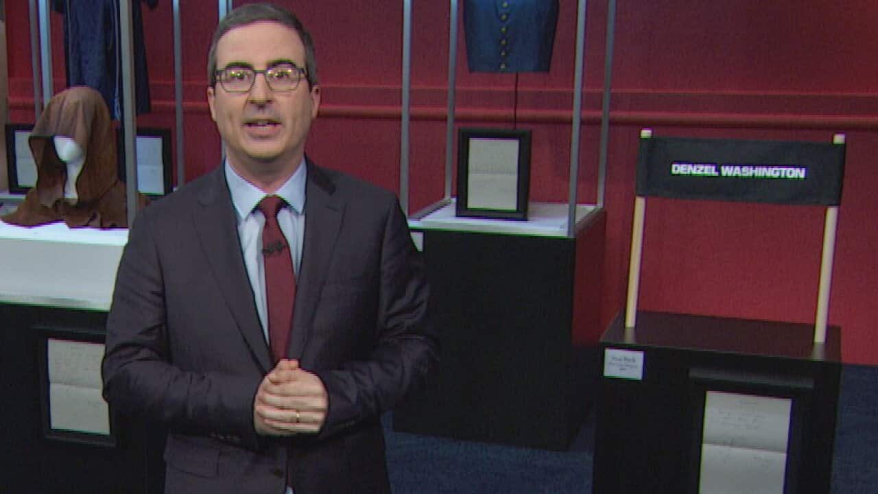 John Oliver with Russell Crowe memorabilia.