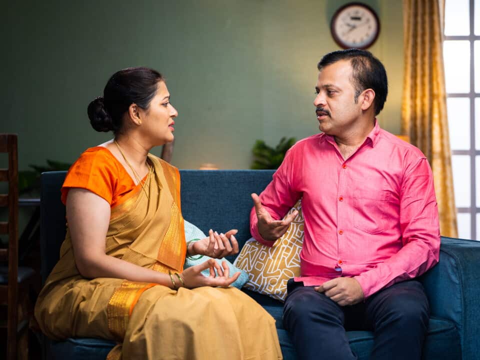 Wife got angry while arguing with husband at home - concept of relationship problems, conflict and unhappy relationship.