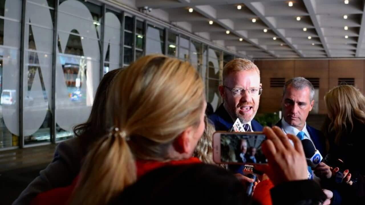 The ABC's Editorial Director Craig McMurtrie speaks to the media as the ABC building was being raided by federal police officers.