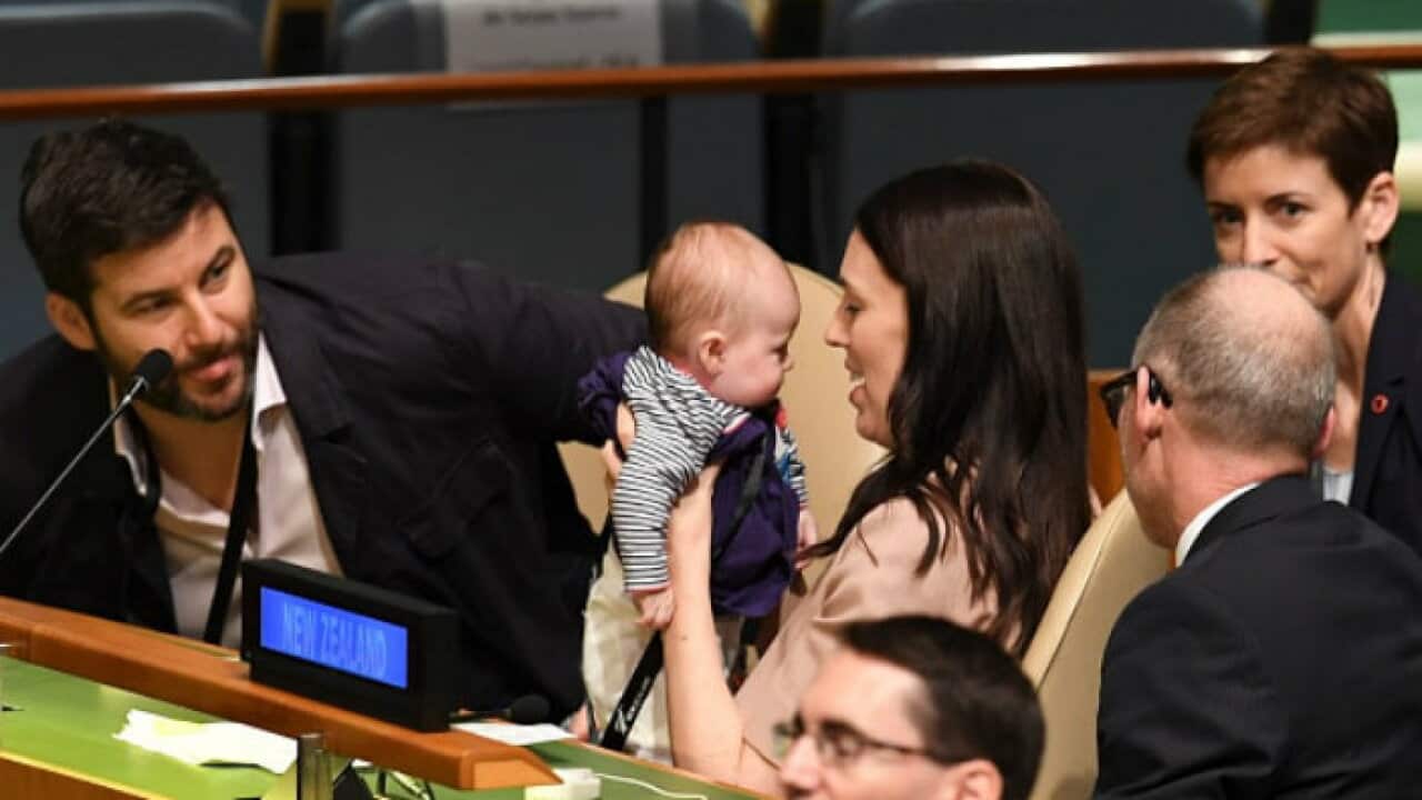 NZ Prime Minister Jacinda Ardern holds her daughter Neve after addressing the UN.