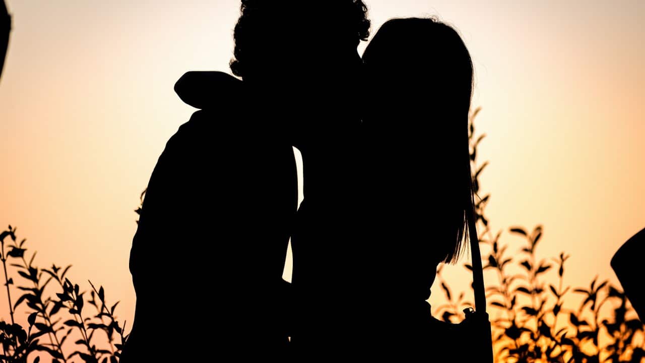 A couple embracing each other in Debod Temple during the