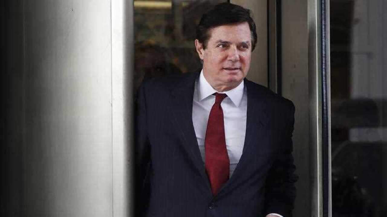 In this Nov. 6, 2017 photo, Paul Manafort, President Donald Trump's former campaign chairman, leaves the federal courthouse in Washington.