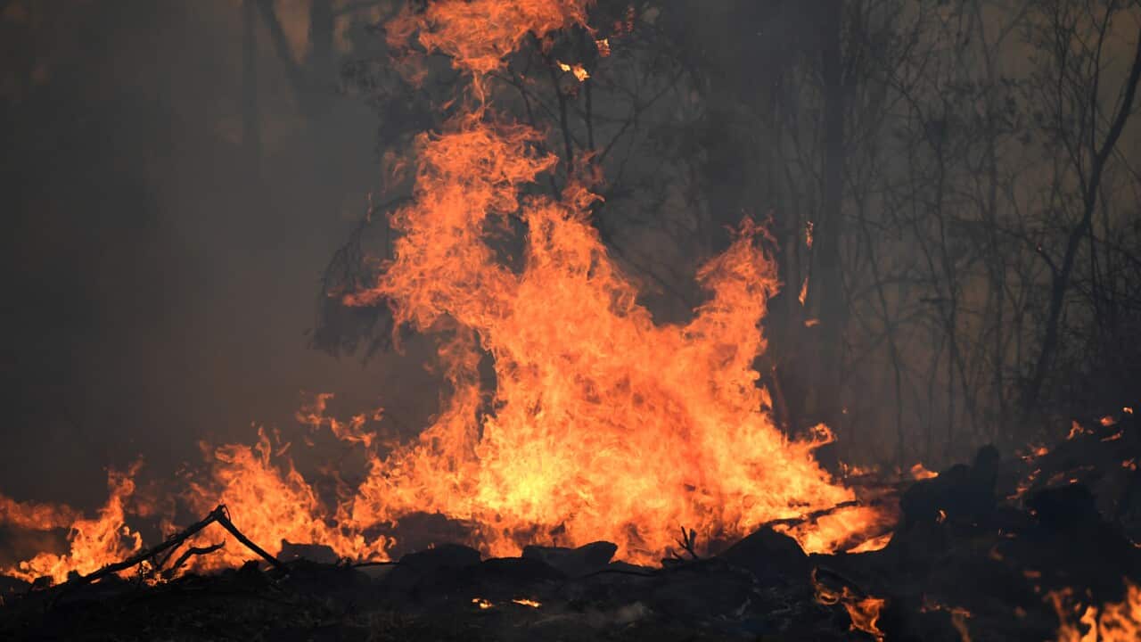 A bushfires burns around a property in Torrington