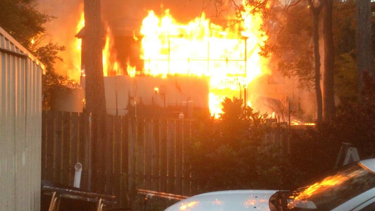 A supplied image shows the scene of a fatal house fire in Russell Island, Queensland, Sunday, August 6, 2023. A house fire which killed five young boys and their father near Brisbane is being treated as potentially suspicious, with police looking into key events that led up to the blaze.