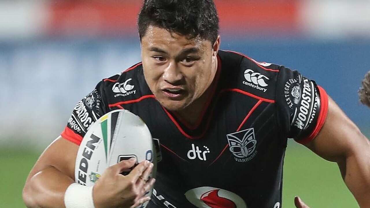 Mason Lino of the Warriors is tackled.