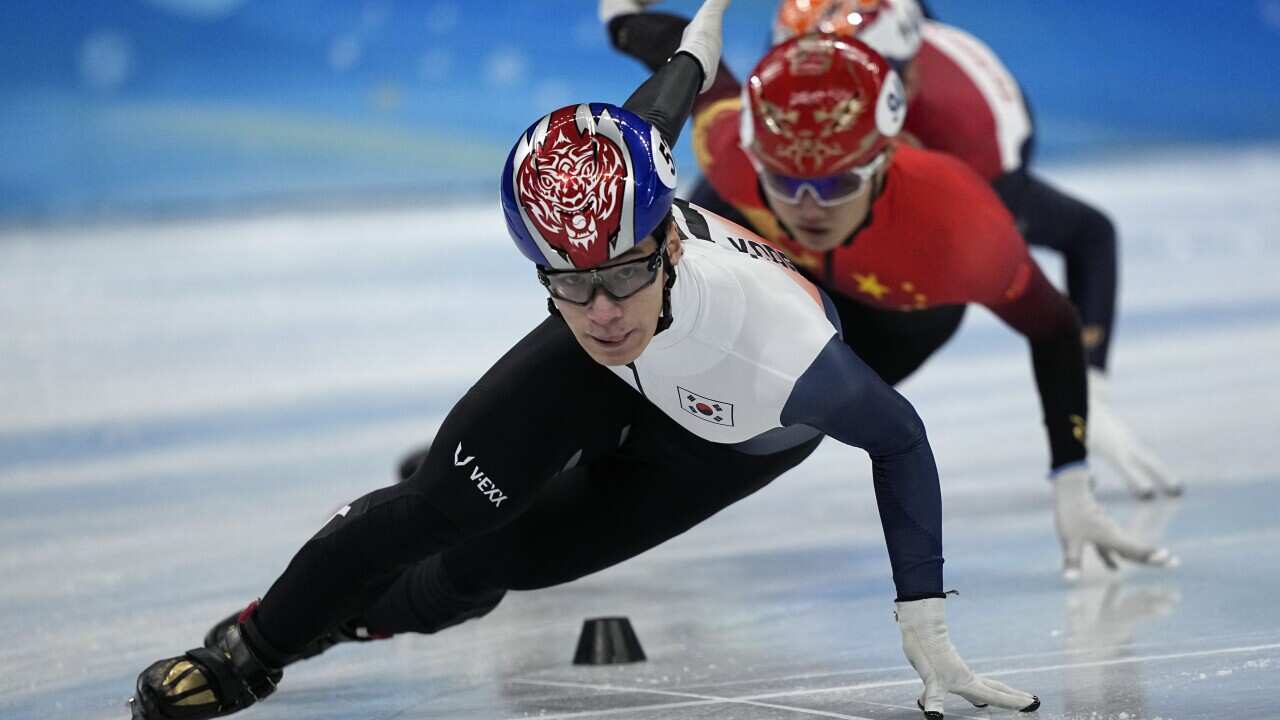 Hwang Dae-heon of South Korea, races in his quarterfinal of the men's 1,000-meter during the short track speedskating competition at the 2022 Winter Olympics, Monday, Feb. 7, 2022, in Beijing. (AP Photo/David J. Phillip)