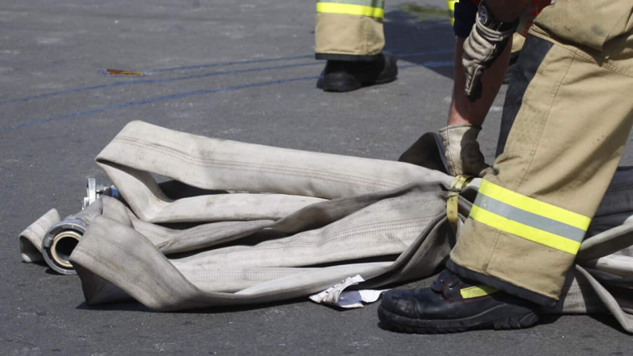 Firefighters at the scene of a fire