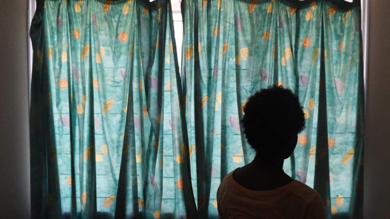 A victim at a Port Moresby women's shelter.