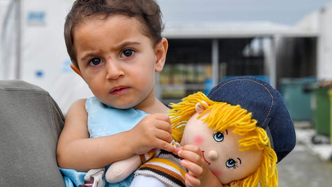 A two-year old Syrian refugee girl at the border between North Macedonia and Greece, near the southern city of Gevgelija, Republic of North Macedonia.