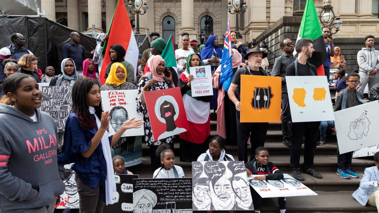 Sudanese demonstrators before Victorian Parliament