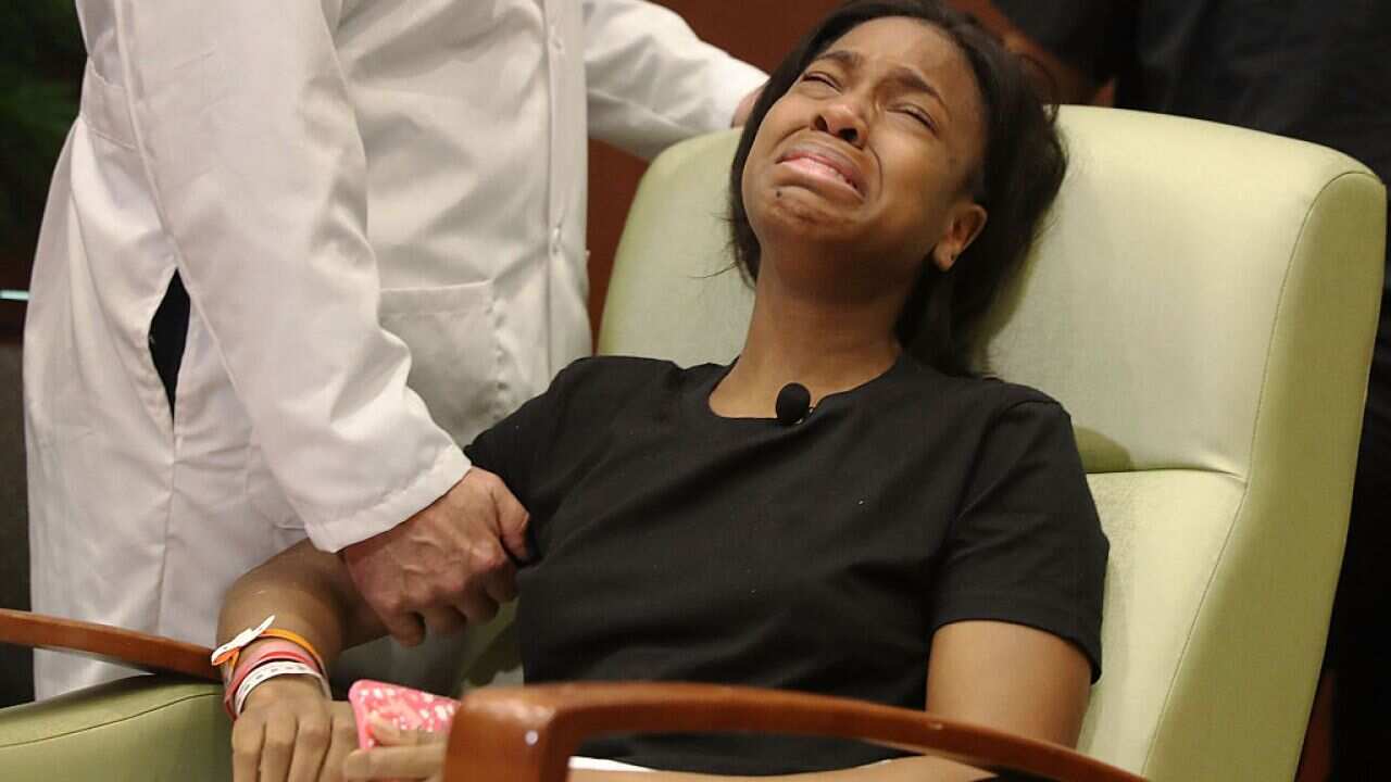 Patience Carter is overcome with emotion after speaking to the media from the Florida Hospital about being shot in the Pulse gay nightclub terror attack