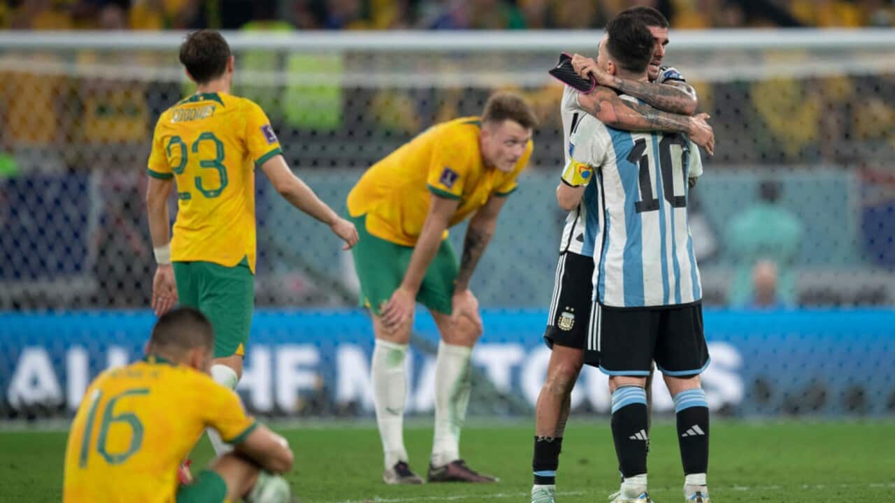 The Socceroos look on as Argentina prevail