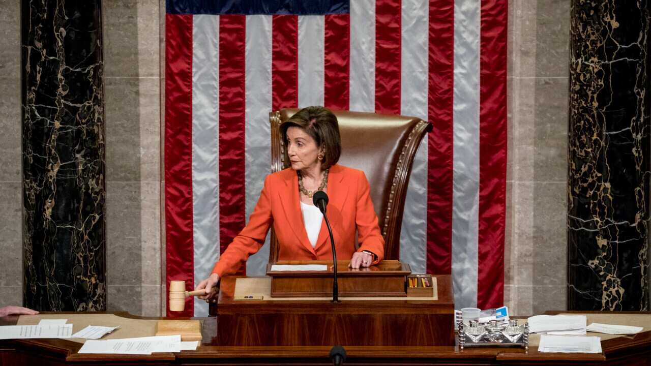 House Speaker Nancy Pelosi gavels as the House votes to pass resolution on impeachment procedure