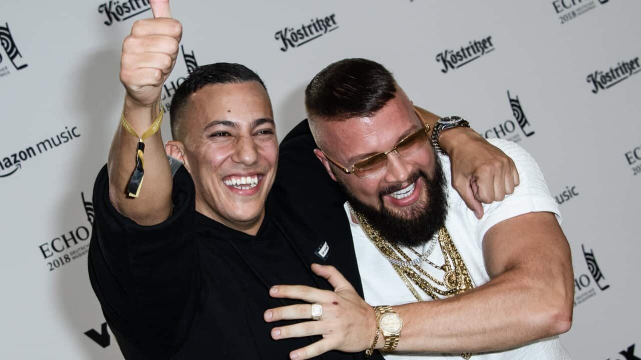German musicians Kollegah and Farid Bangpose on the red carpet as they attend the 27th Echo 2018 music awards in Berlin, Germany.