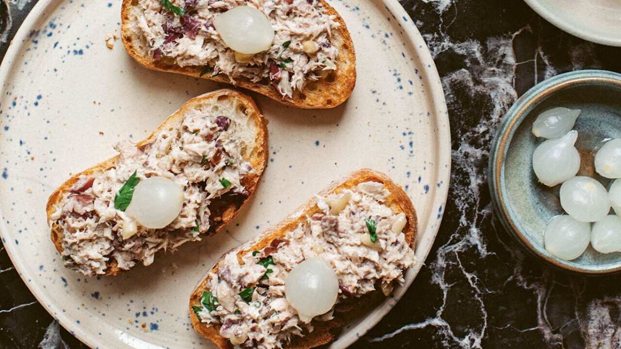 Crostini with mackerel, olives and pine nuts
