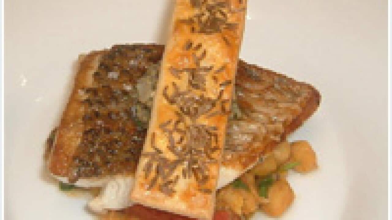 Roasted fillet of barramundi on a chickpea casserole