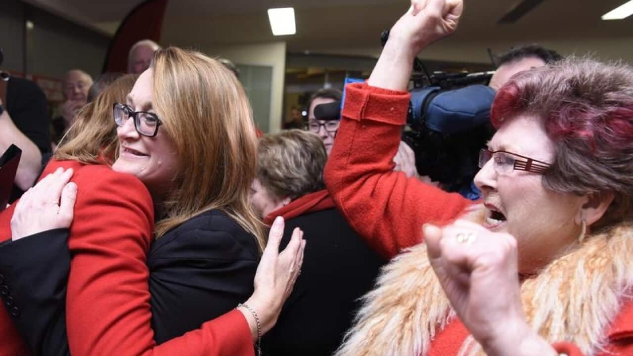 Justine Keay celebrates her by-election win with supporters.
