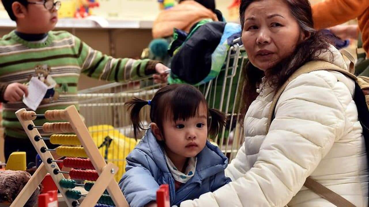 China's working-age population continued to fall in 2014, the government said on January 20, as Beijing struggles to address a spiralling demographic challenge made worse by its one-child policy. GOH CHAI HIN/AFP (Getty images)