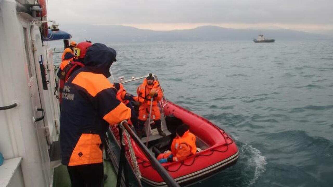 Rescuers searching in the Black Sea near coastline of Sochi for wreckage of doomed Russian Tu-154 plane that belonged to the Russian Defence Ministry